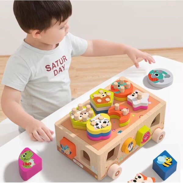 Jeu d'éveil bus pâtissier en bois